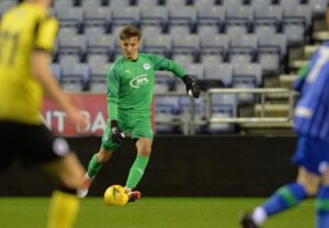 Owen Mooney in Pulsegk Goalkeeper Gloves and in Wigan Kit